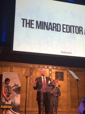 John Brecher accepts the Lawrence Minard Editor Award