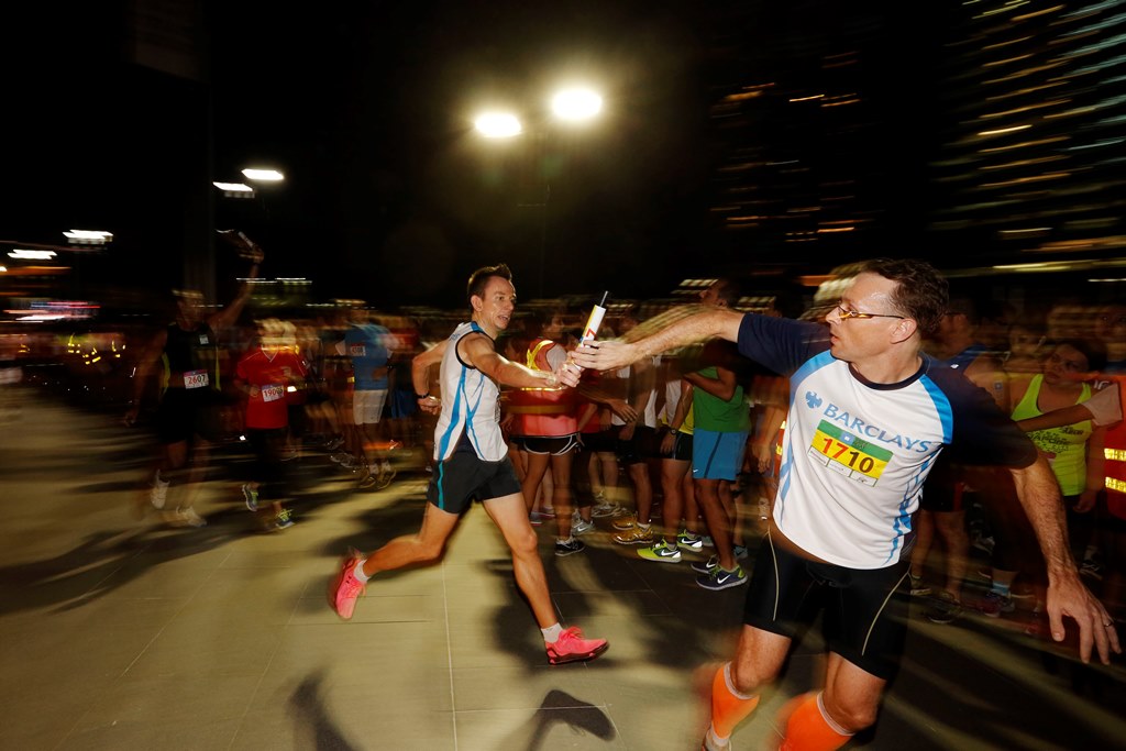Team Barclays in action during the Bloomberg Square Mile Relay Singapore 2014