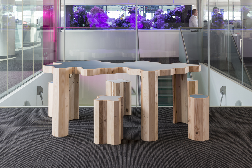Soft Baroque’s 'Cloud' tables are made from pallet wood and filled with poured drifts of resin. 