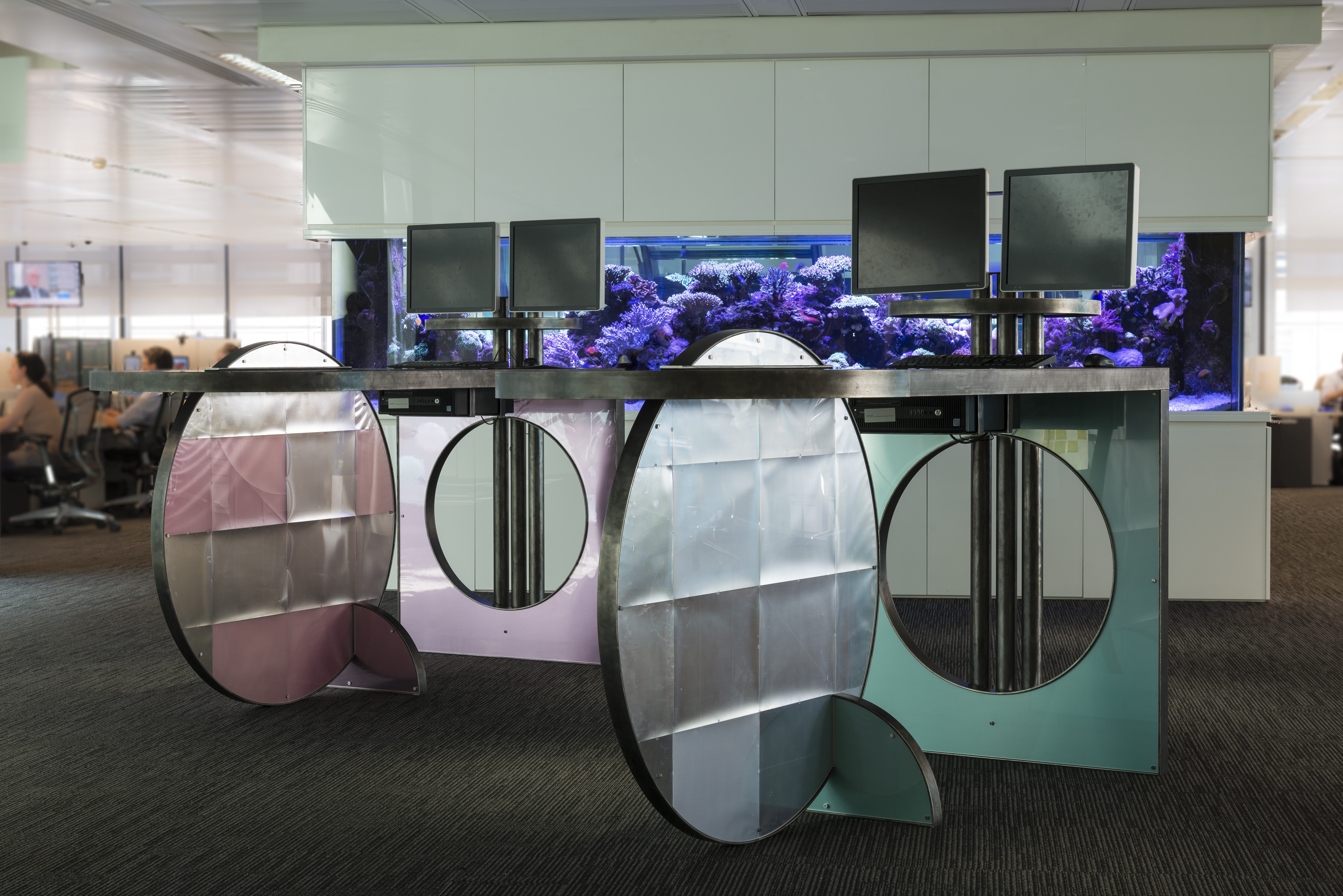 Lara Bohinc's 'Saturn’ tables feature holographic sheets from 160 computer screens 