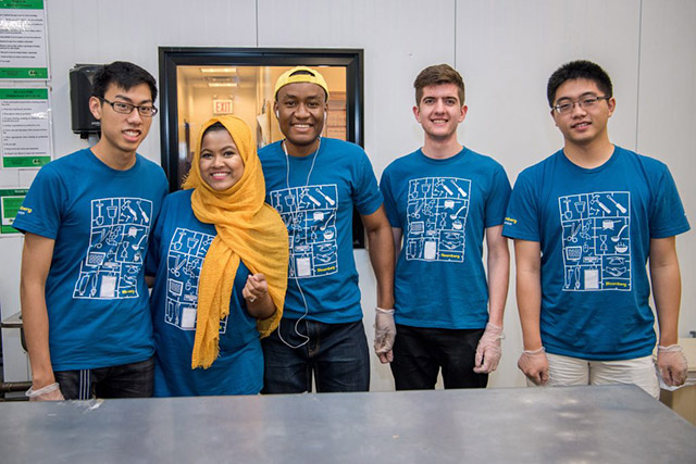 Bloomberg interns packed 7,502 meals to be distributed among the community