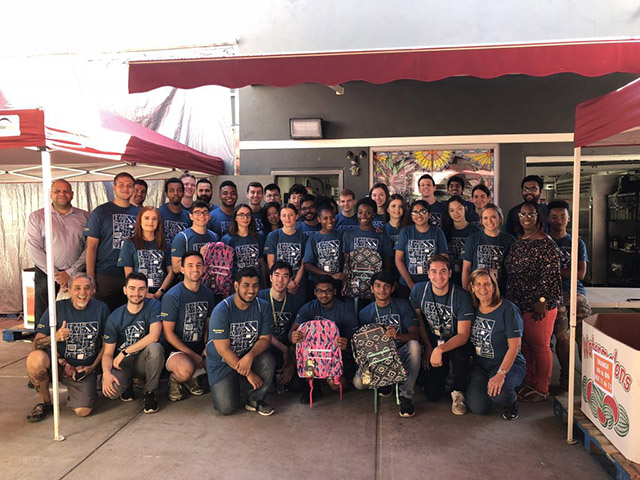 Bloomberg interns packed 1,200 backpacks with school supplies