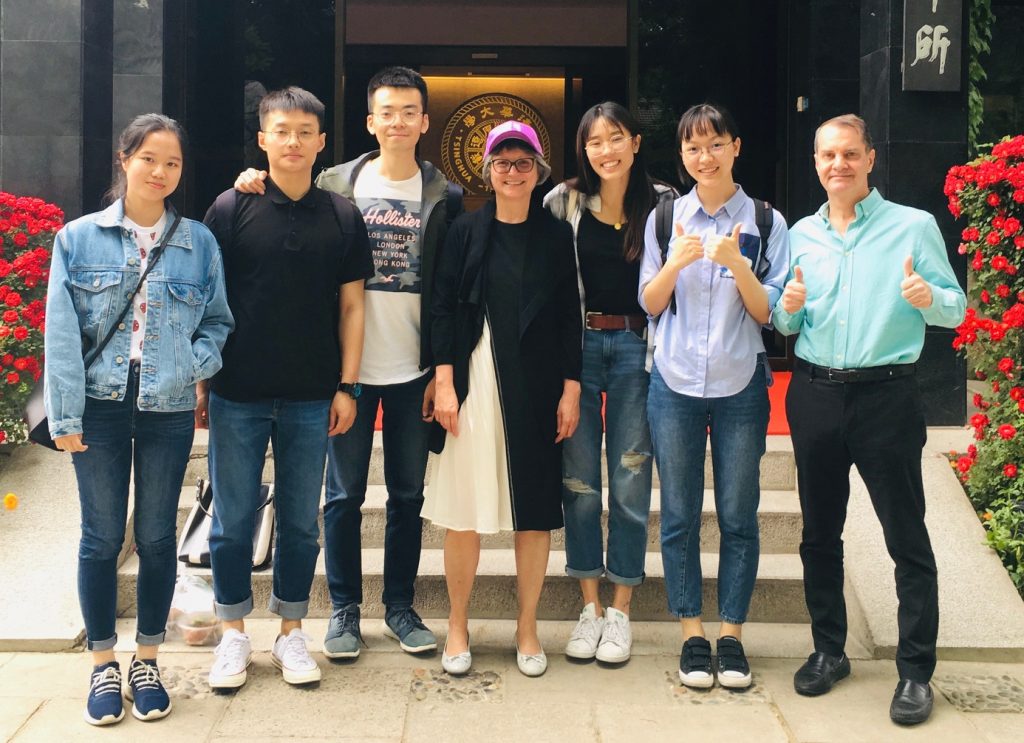 Executive Editor Madeleine Lim (center) at Tsinghua University following a lunch for some of the competition finalists, along side Lee Miller (far right).